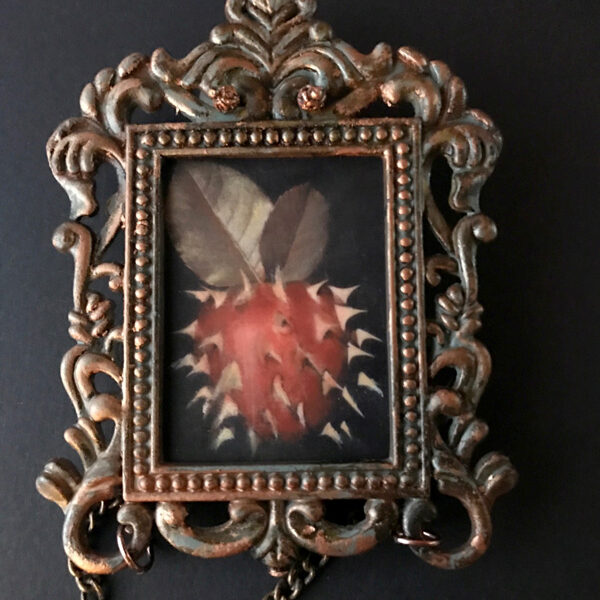 </br>
<b>DK Burger</b>
</br>
<i>Eve's Apple</i></br>
One of a Kind Hand Painted Silver Gelatin Print, with Dagger Charm on Chain</br>7" x  3"  •  $125 <br><font size="+7"><font color="red">  •</font></font>