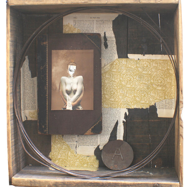 </br> <b>John Trainor</b> </br> <i>Portal</i></br>Paper, wood, and metal</br>16.75” x 15.25” x 5.75”  •  $600.
</br> 