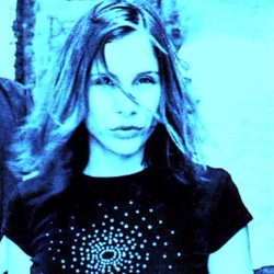 image003-2 Woman in blue-tinted artistic photo.