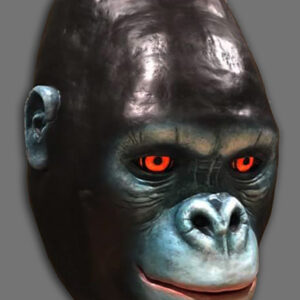 A gorilla with red eyes and black hair.