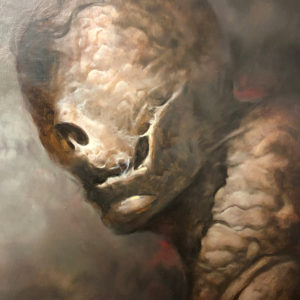A painting of an animal with horns and a face.