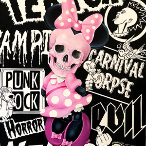 A pink skull with polka dots and a bow.