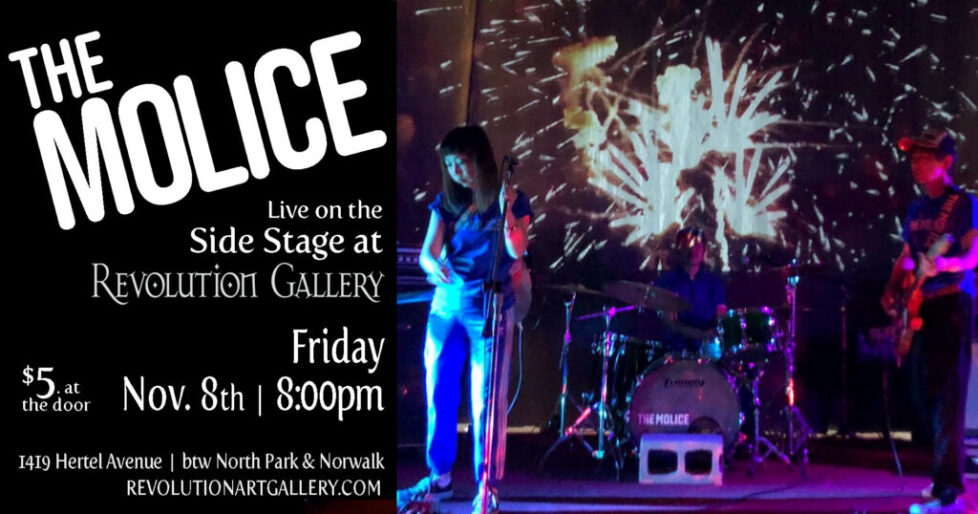 MOLICE_NOVEMBER8th-1 Band performing on stage with fireworks background.