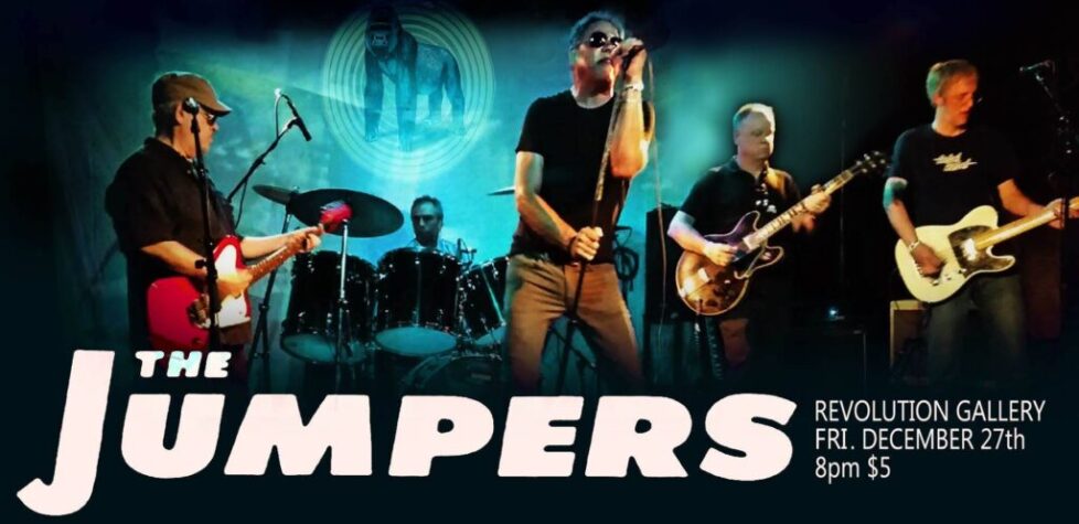 THE_JUMPERS-1 Band performing live with instruments on stage.