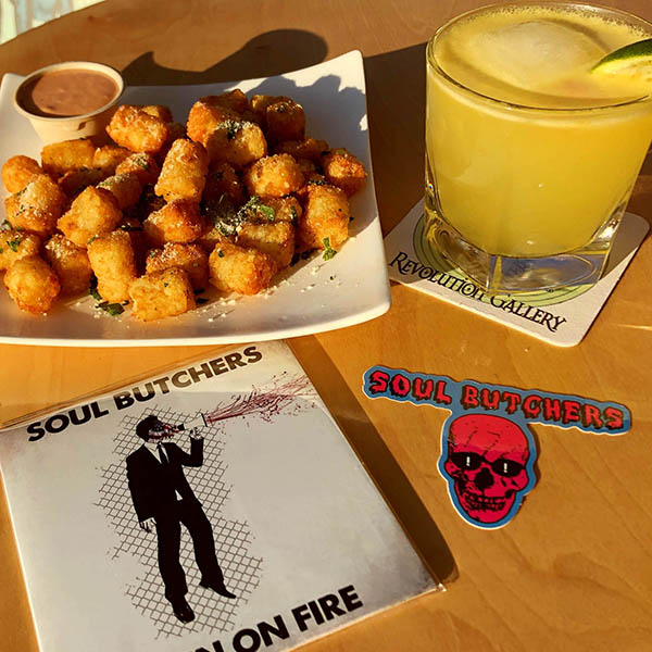 skin on fire package to go A table with some food and drinks on it