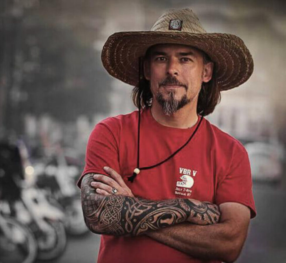 GALLEY_BY_KRISTIN_RICE_PHOTOGRAPHY-1 Man in red shirt and straw hat.