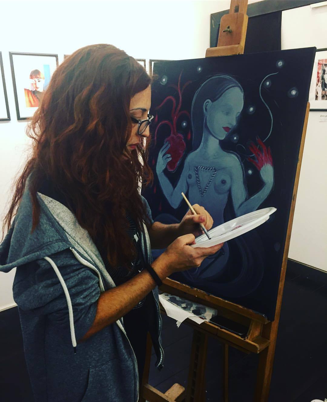 GERLANDA_DI_FRANCIA-1 Artist painting a surreal artwork on canvas.