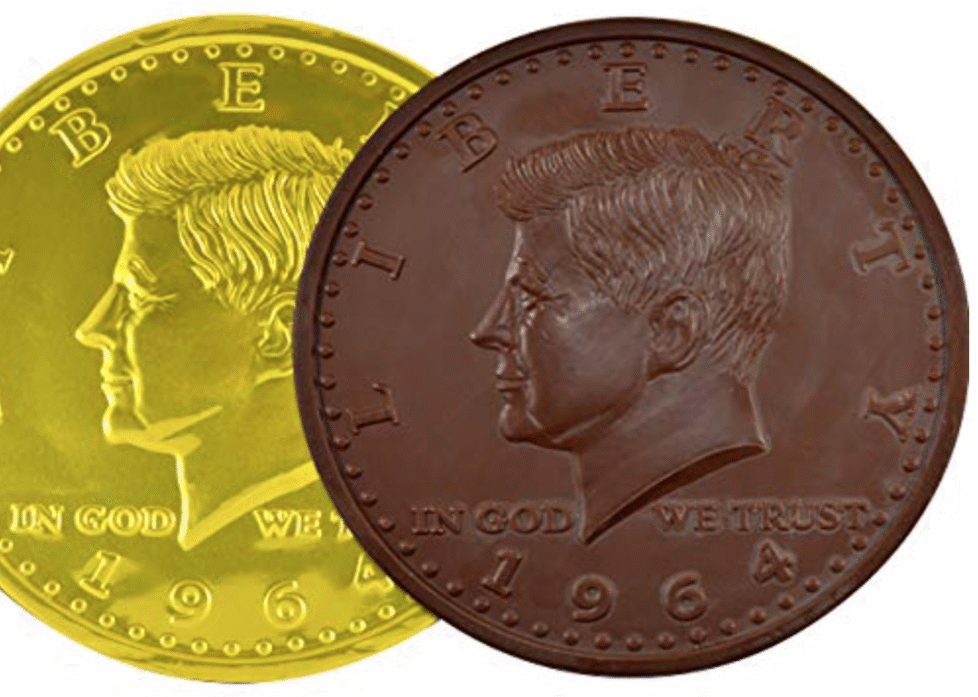 Gold and bronze coins featuring JFK profile.