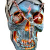 A skull with chains and a man on it