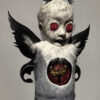 A doll with black and red eyes, white feathers, and a fake face.