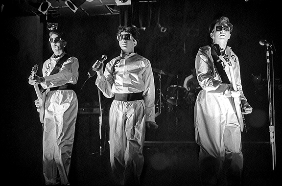 Members of the band Devo perform live at The Paradise Rock Club in 1976 in Boston, Massachusetts.